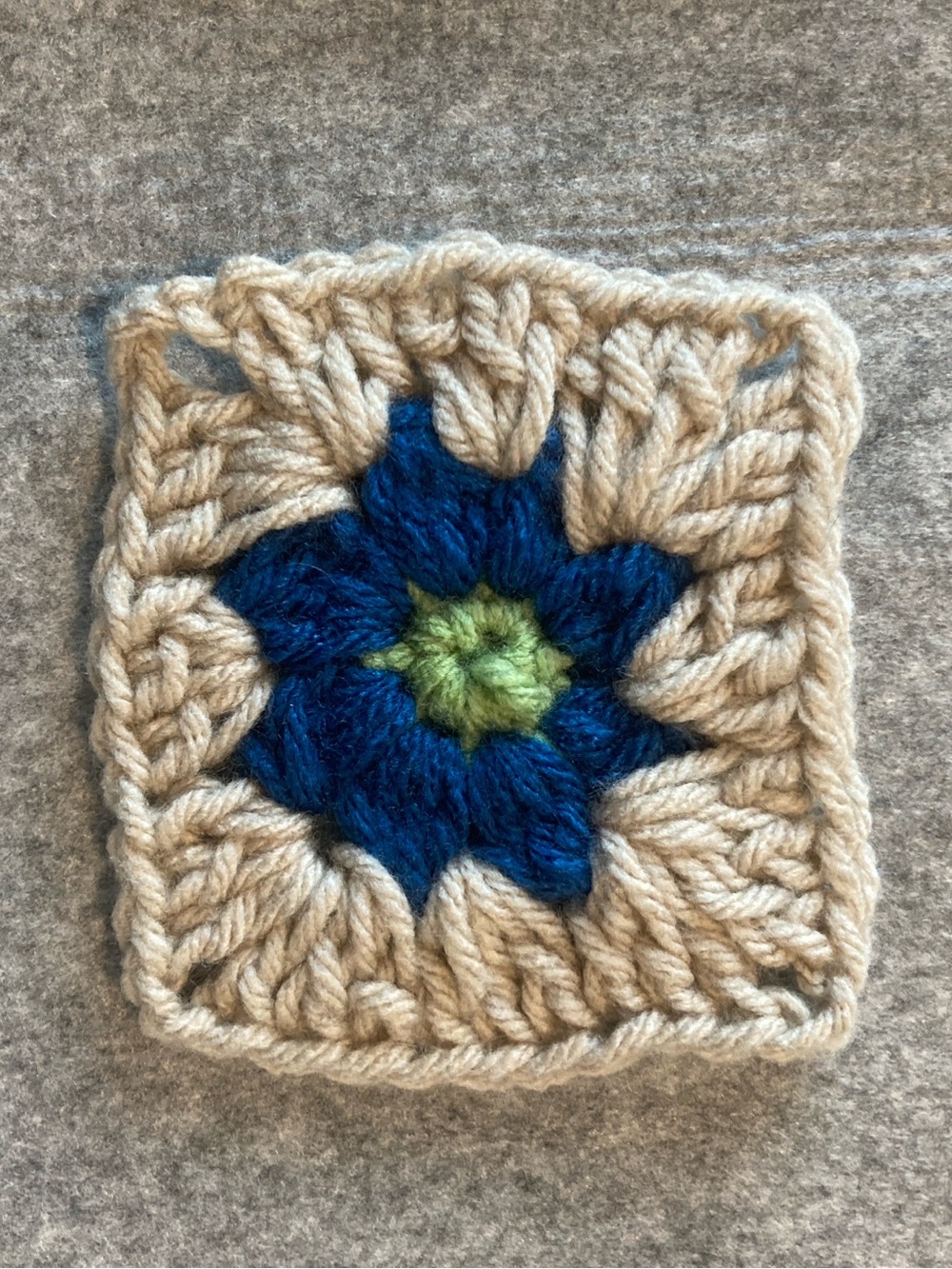 Handmade Crochet Granny Square with Blue Flower